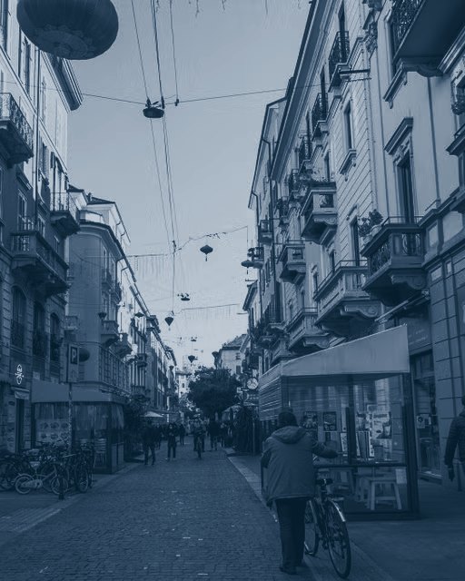 Via Paolo Sarpi, the street at the heart of Milan's Chinese community, with red lanterns hanging above it